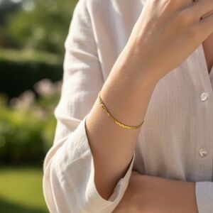 14KGP Stamped Yellow Gold-toned Herringbone Snake Pattern Chain Style Bracelet.